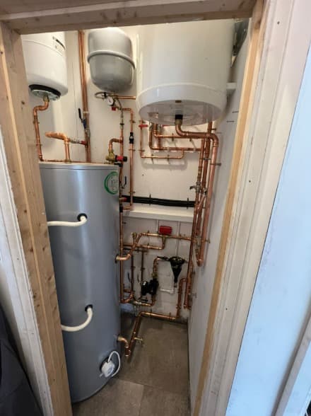 Heat pump cylinder and pipework after an oil boiler swap